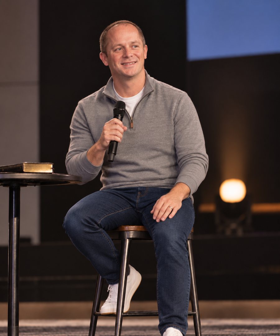Doug Goodmundson speaking on stage